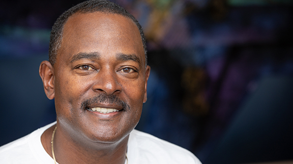 Shambeni showing his smile after laser dentistry - Vicksburg, MS